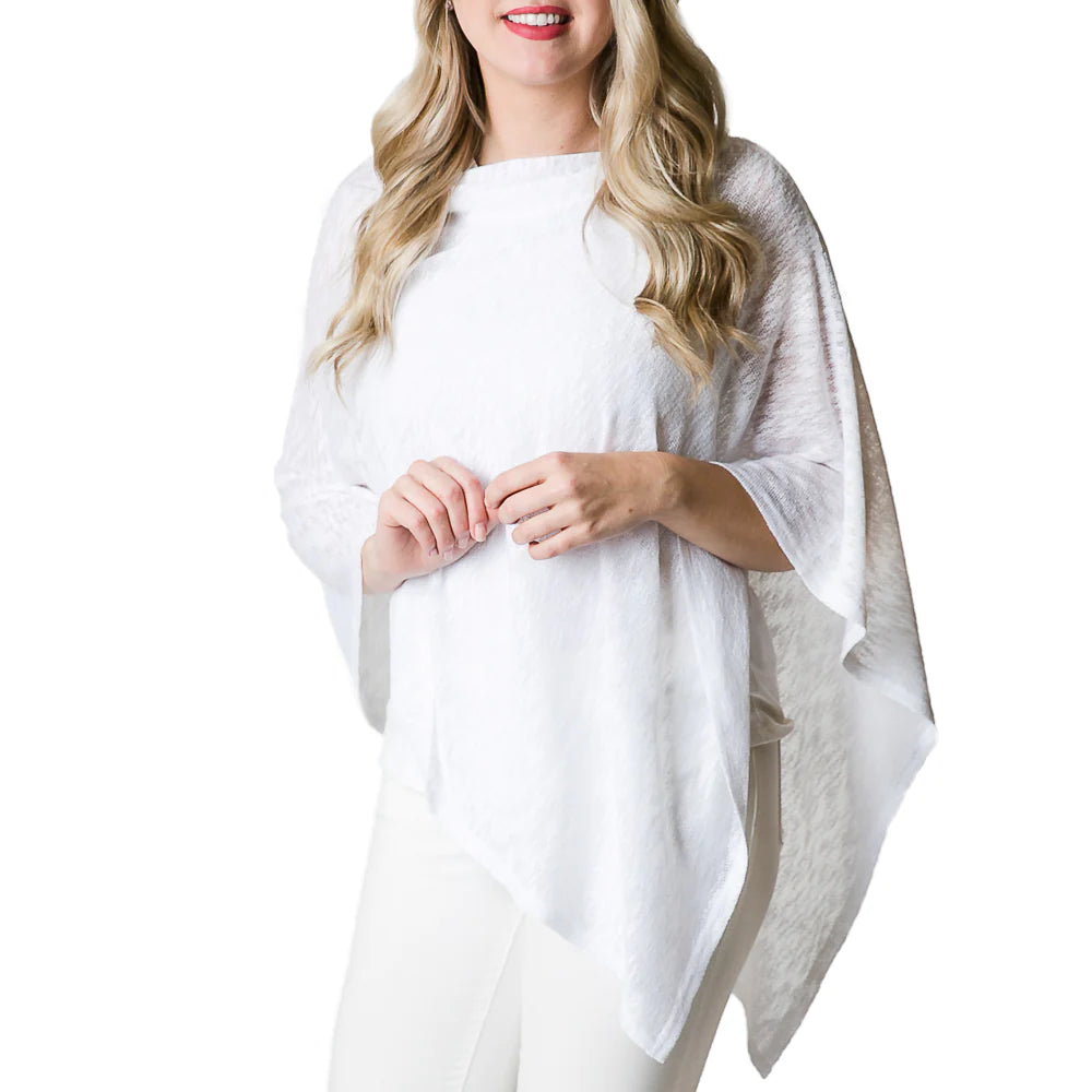 Emily Poncho, available in black and white